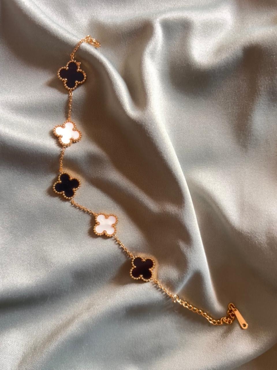 Gold-Tone Alternating Black and White Clover Bracelet